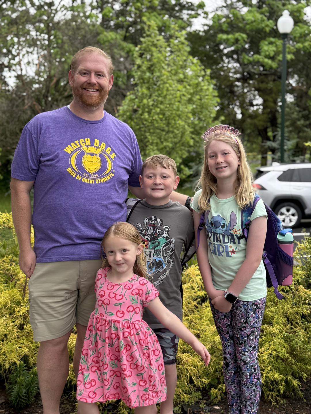 Will Glass, Top Dog coordinator, and his three children